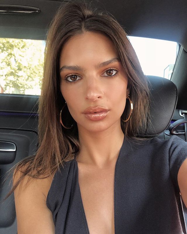 Emily Ratajkowski Snaps Selfie With Black Top and Hoop Earrings