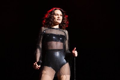 Jessie J black leather outfit on stage concert