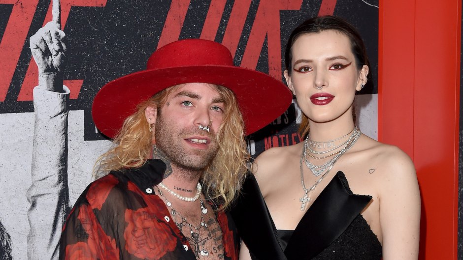 Mod Sun in Red Hat and Bella Thorne in Black Strapless Dress Pose on Red Carpet Married Wedding Ceremony