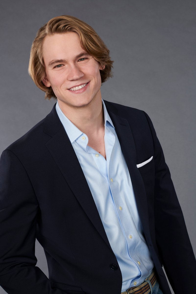 Bachelorette Contestant John Paul Jones Smiles in Cast Photo in Blue Button Down Shirt and Blazer With White Pocket Square