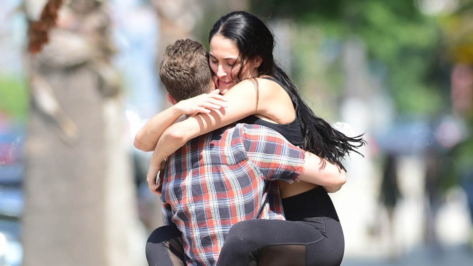 Nikki Bella Hugs Artem Chigvintsev While She Wraps Her Legs ARound Him