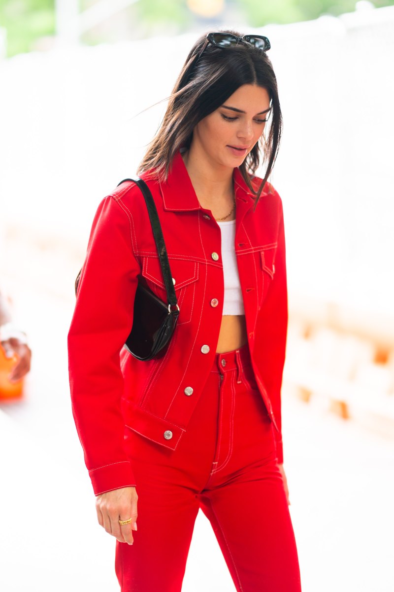 Kendall Jenner red outfit red jacket red pants no makeup