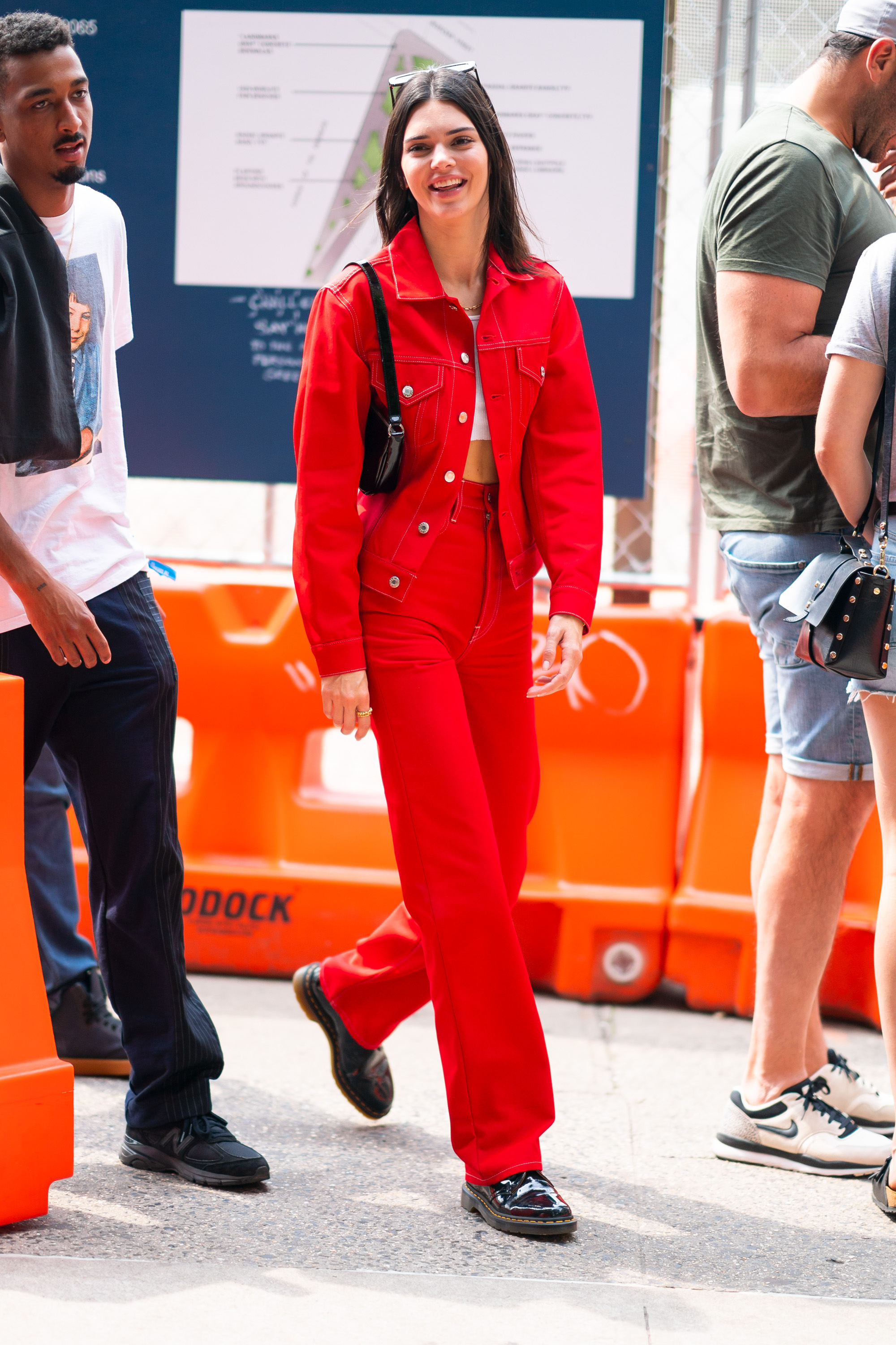 Kendall Jenner red jacket red pants black shoes white crop top
