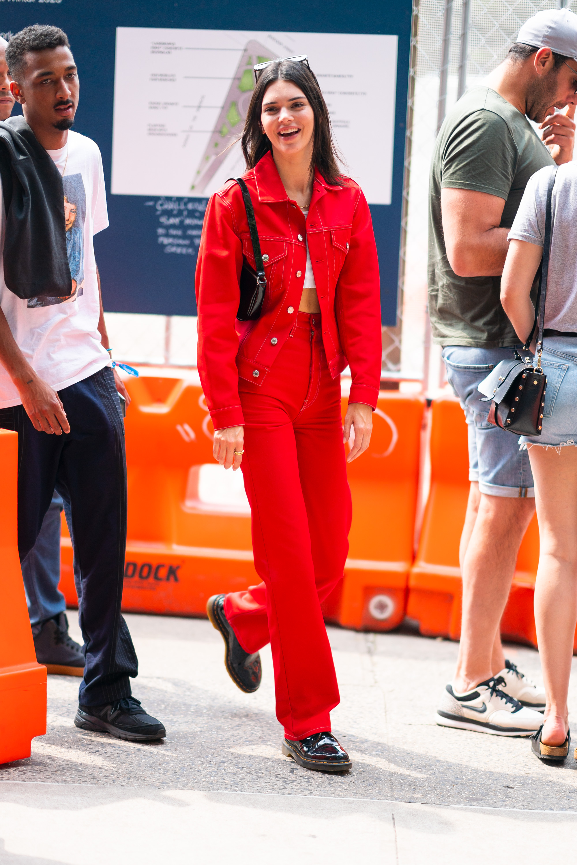 Kendall Jenner nyc red outfit red jacket sunglasses black purse