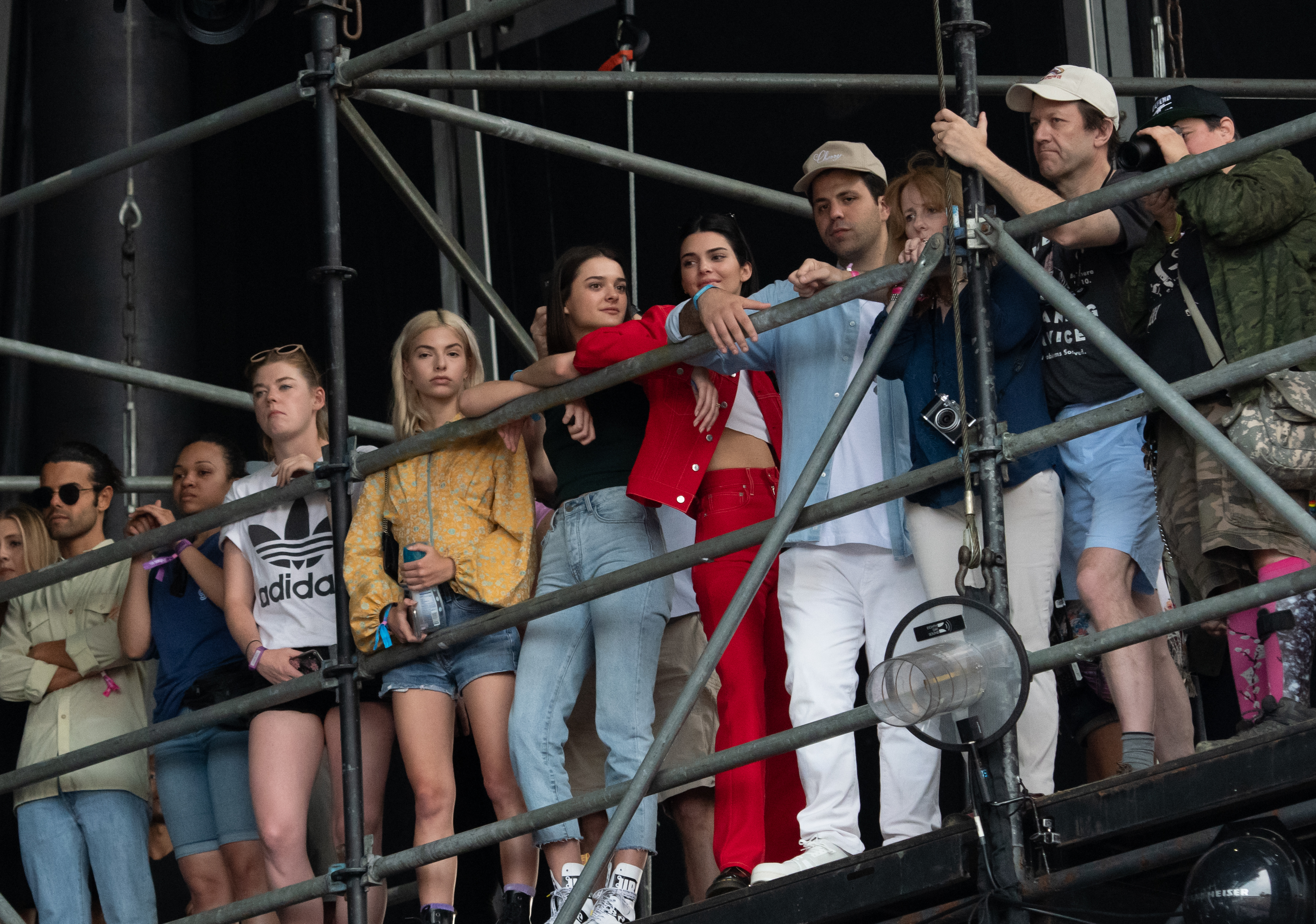 Kendall Jenner red outfit 2019 Governors Ball Festival watching kacey musgraves