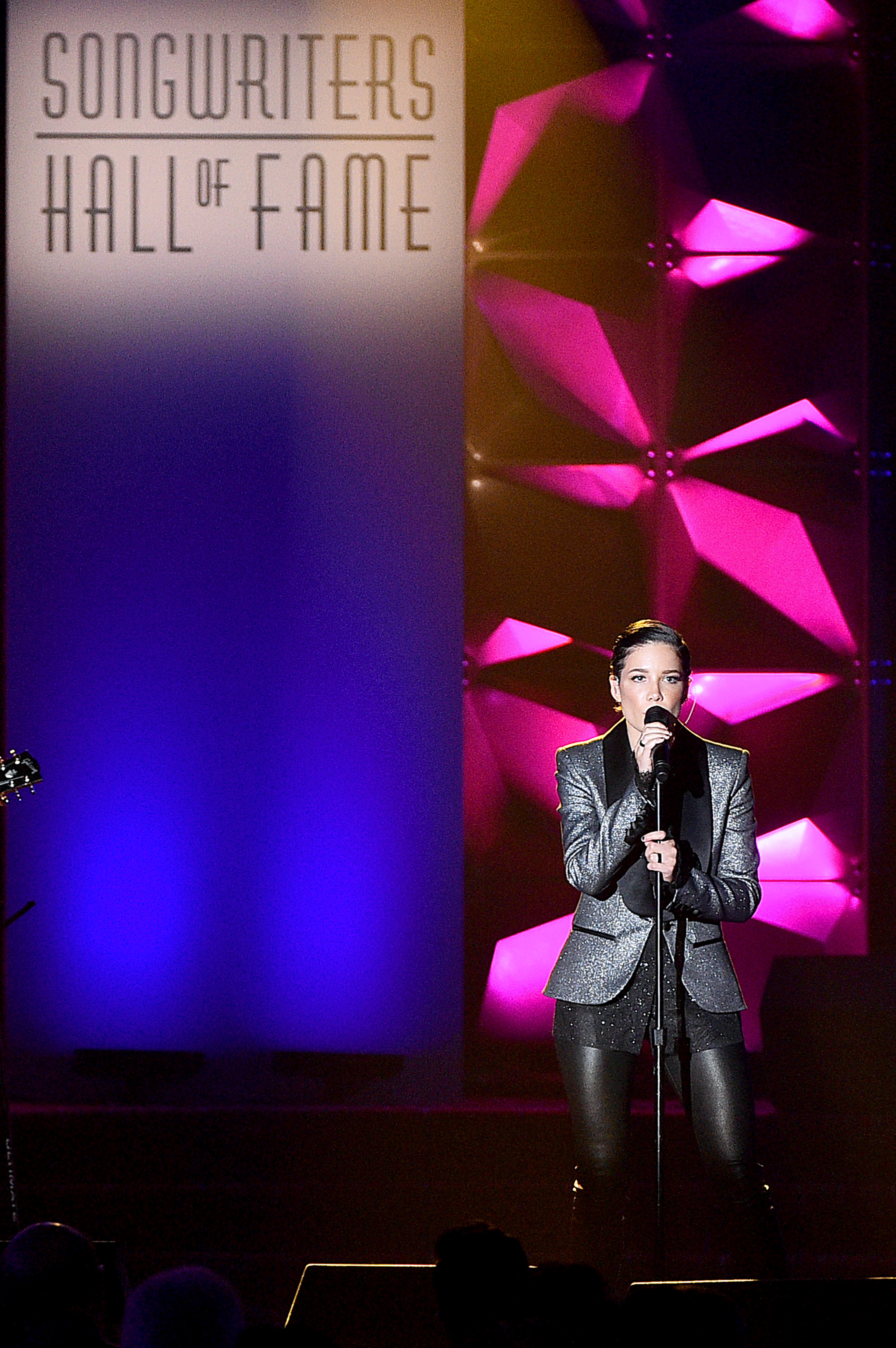 Halsey Sings at Songwriters Hall Of Fame in Grey Suit Jacket and Black Leather Pants