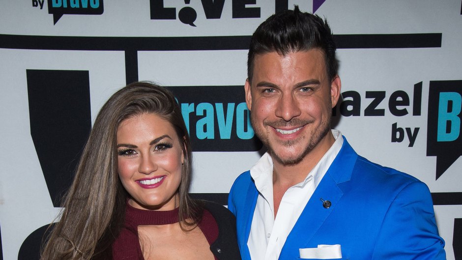 Brittany Cartwright in Maroon Top and Jax Taylor in a Bright Blue Suit Pose Together