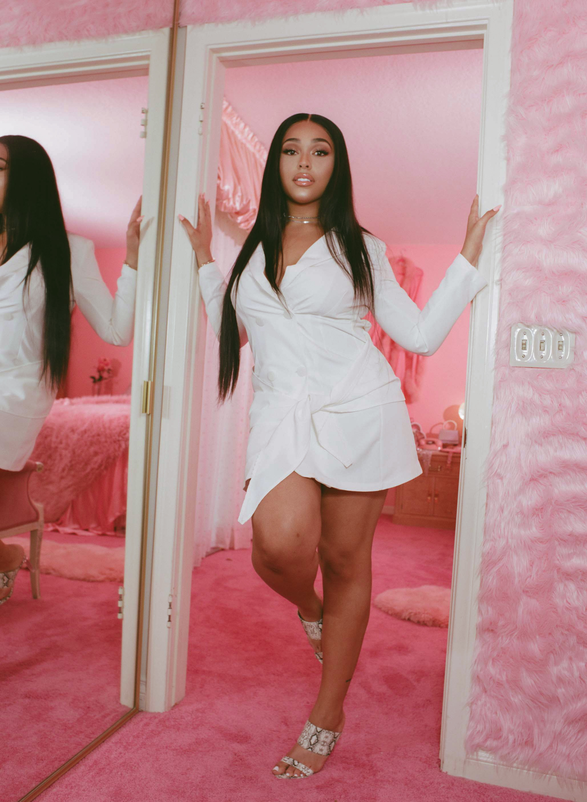 Jordyn Woods modeling her Boohoo collection