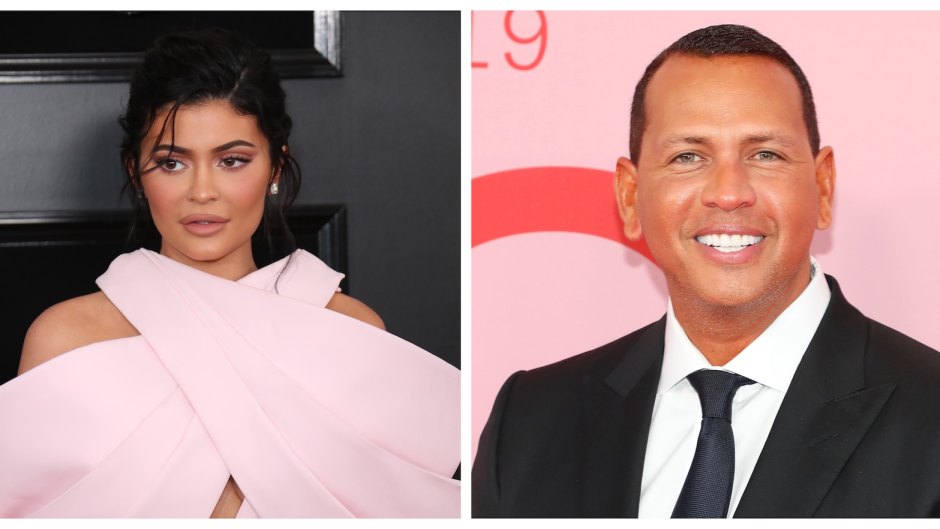 Kylie Jenner in pink criss cross dress Alex Rodriguez in suit