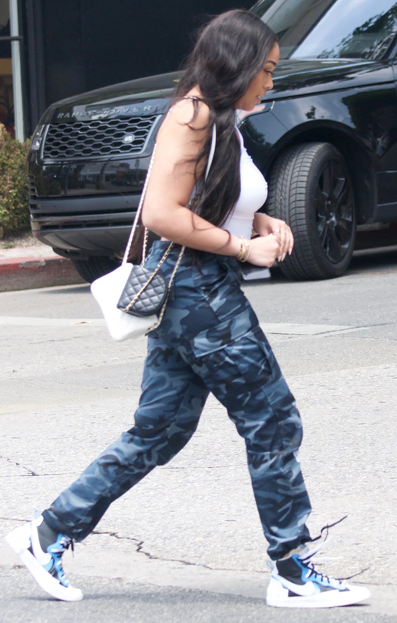 Jordyn Woods shopping camo pants butt body