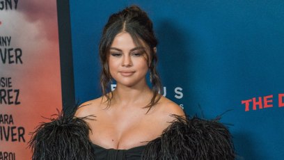 Selena Gomez black feathered dress silver earrings messy bun dead don't die premiere nyc