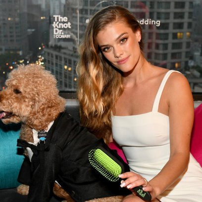 Nina Agdal In a White Dress With a Dog