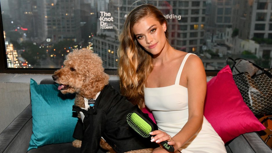 Nina Agdal In a White Dress With a Dog