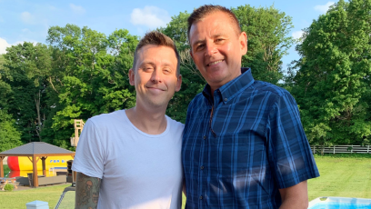 Roman Atwood posing with his dad, Curtis