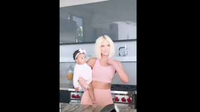 Khloe Kardashian True Thompson good american photo shoot pink sports bra and pants