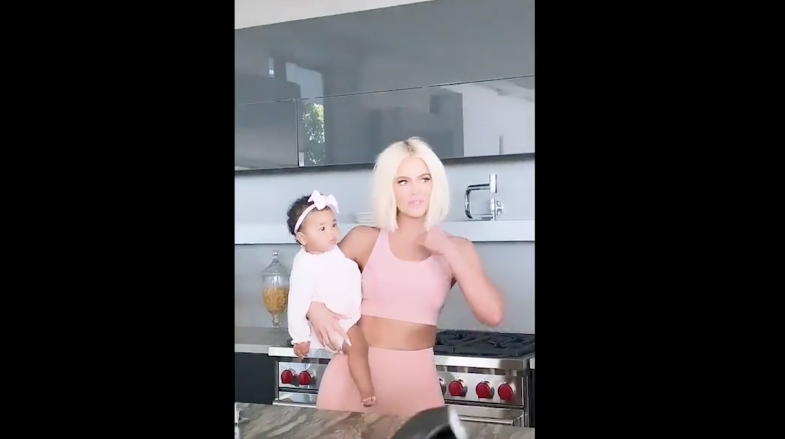 Khloe Kardashian True Thompson good american photo shoot pink sports bra and pants