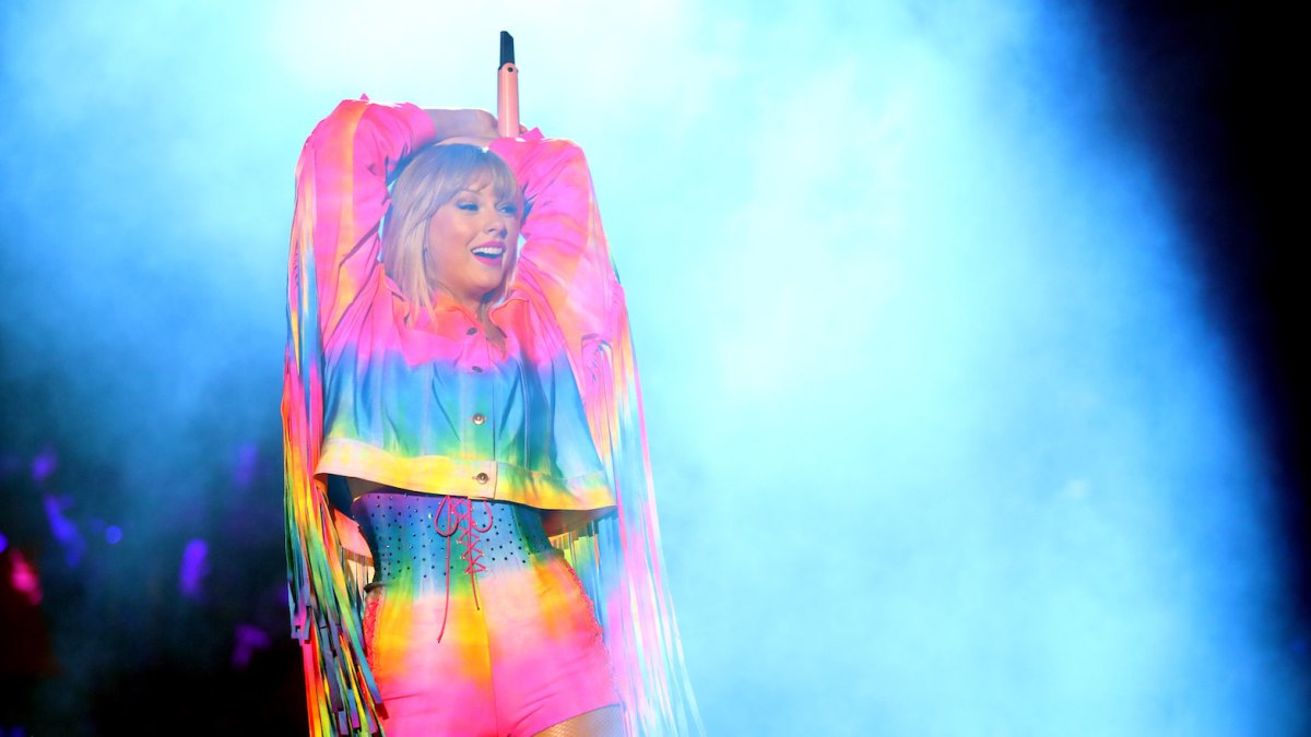 Taylor Swift Wearing Rainbow at a Concert