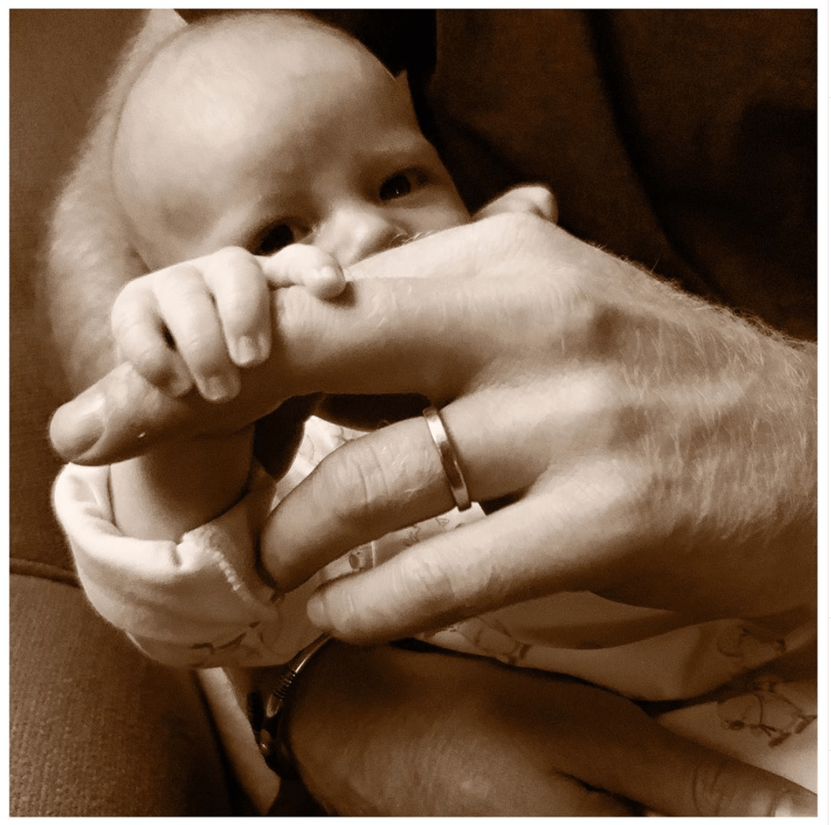 Baby Archie Held by Prince Harry