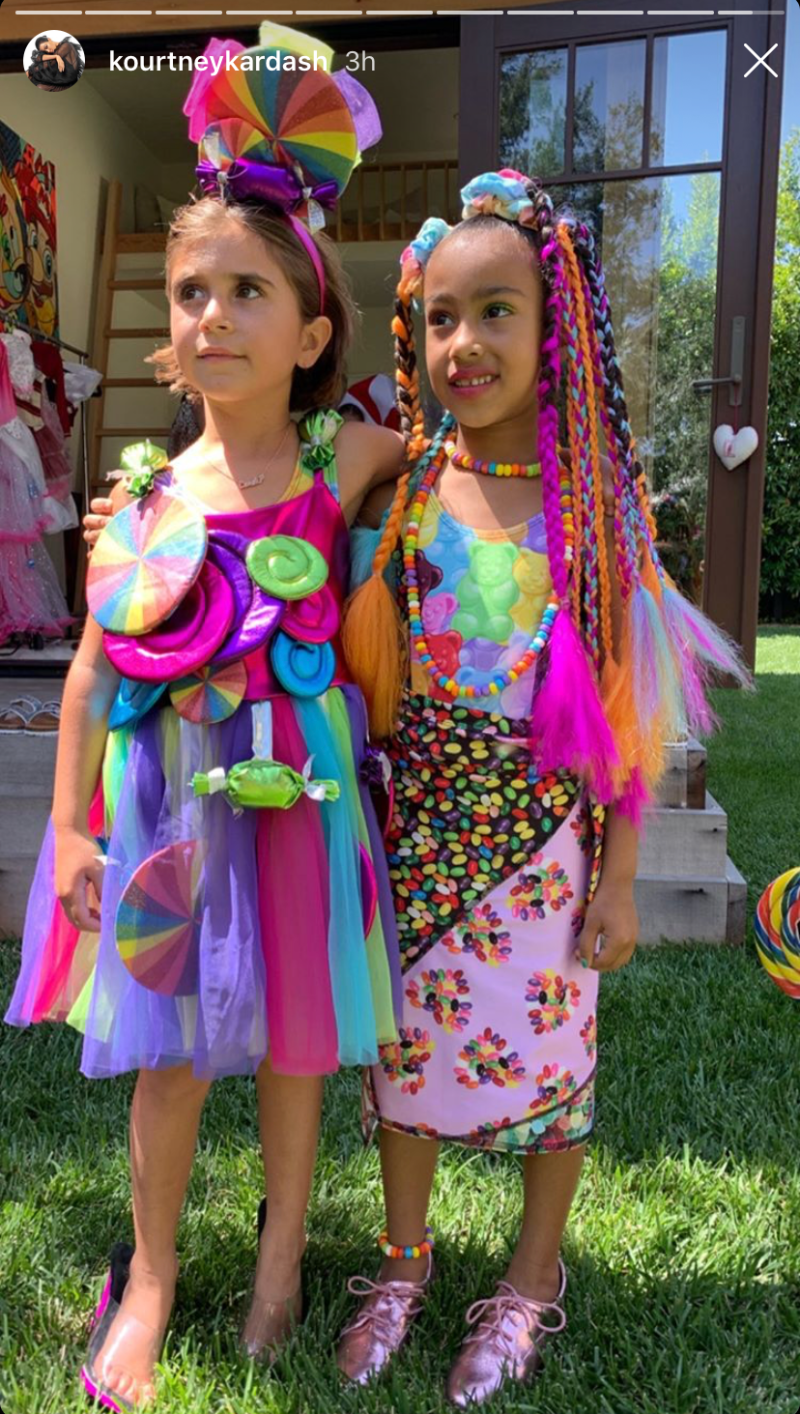 North West and Penelope Disick Dressed Up in Neon Candy Clothes