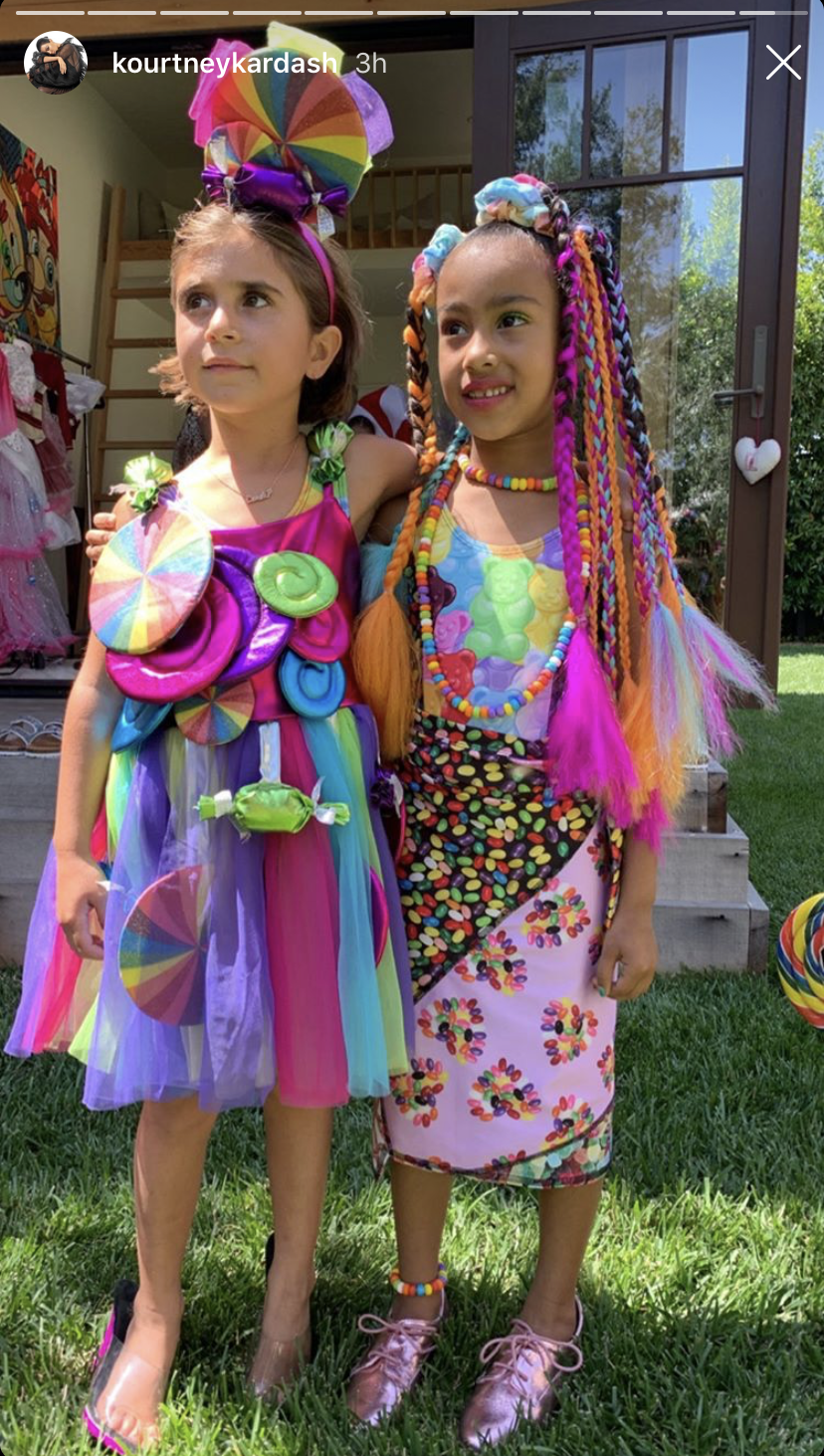 North West and Penelope Disick Dressed Up in Neon Candy Clothes
