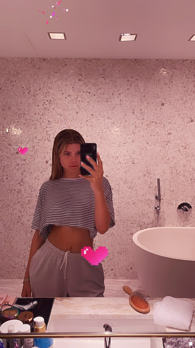 Sofia Richie Takes a Mirror Selfie in a Striped Crop Top Tshirt