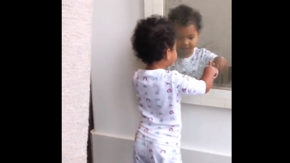 True Thompson Plays Peek-a-Boo in Mirror