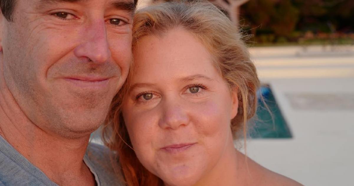 Amy Schumer Gives Husband Chris Fischer A Haircut Watch Video