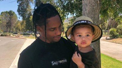Travis Scott Holding Stormi Webster