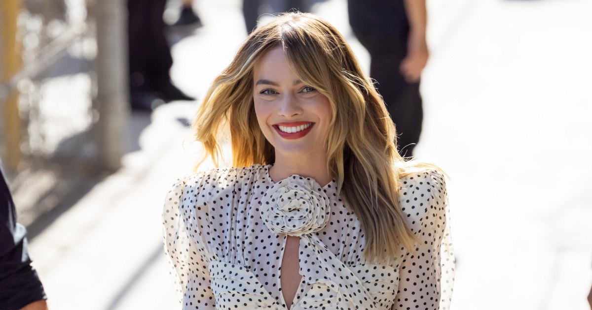 Margot Robbie Wears Sexy White Swimsuit in Cannes