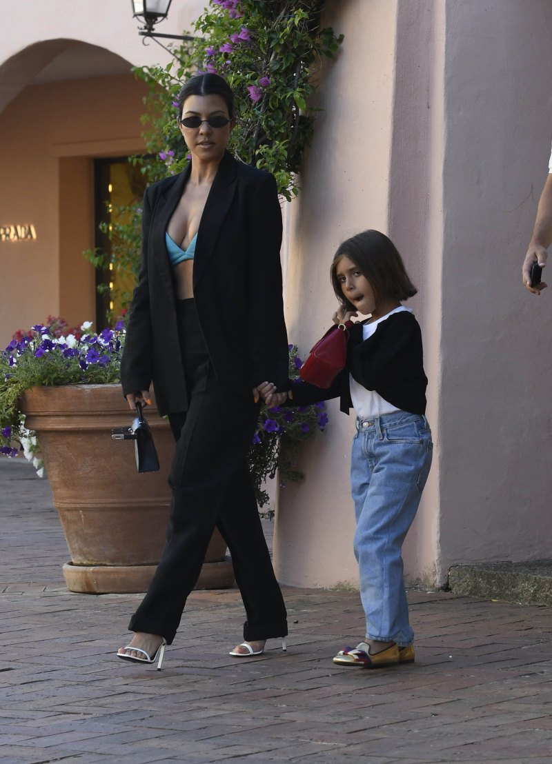Kourtney Kardashian Out With Penelope Disick in Italy Wearing Green Bra and Black Suit