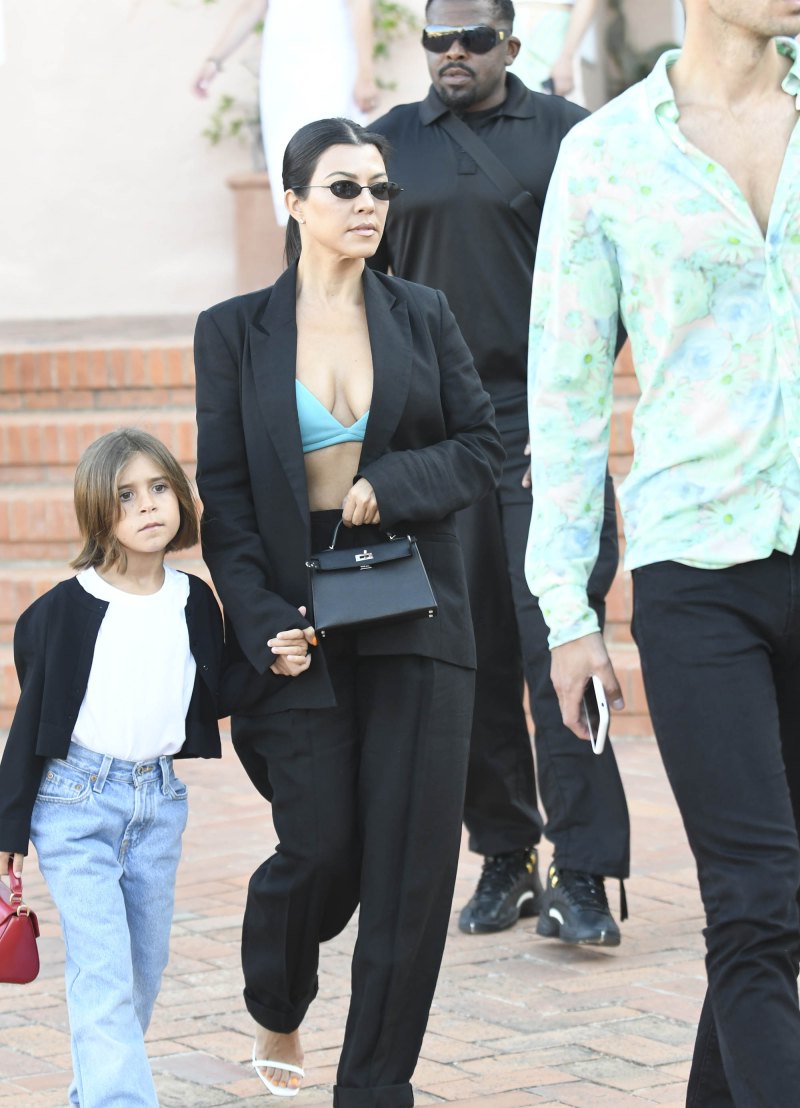 Kourtney Kardashian Out With Penelope Disick in Italy Wearing Green Bra and Black Suit