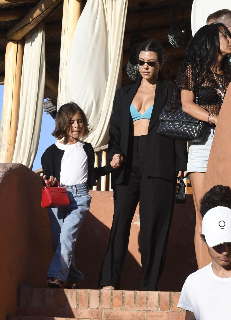 Kourtney Kardashian Out With Penelope Disick in Italy Wearing Green Bra and Black Suit