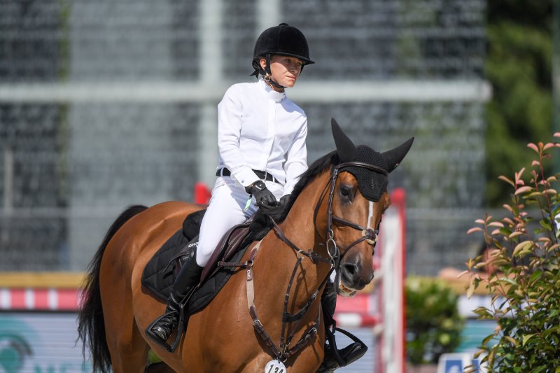 Mary Kate Olsen riding Naomi competes in the Paris Eiffel Jumping