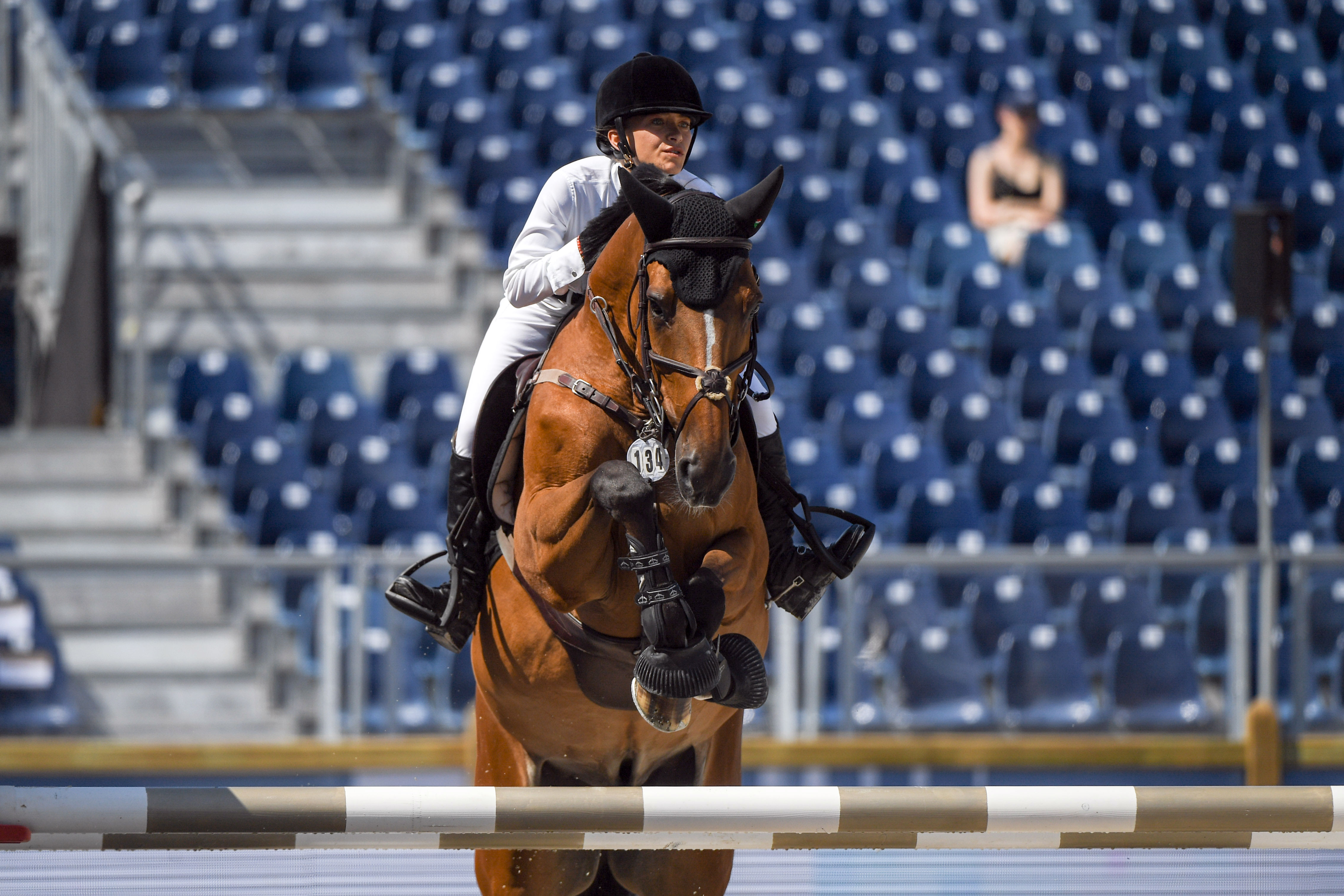 Mary Kate Olsen riding Naomi competes in the Paris Eiffel Jumping