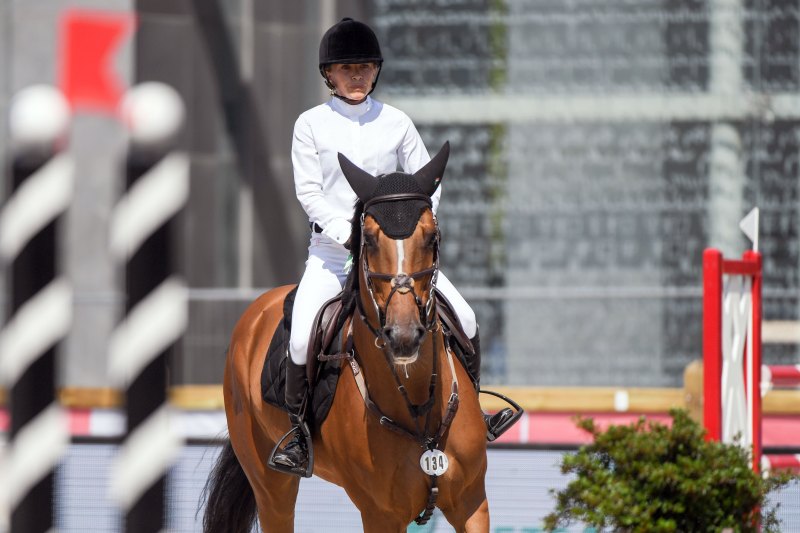 Mary Kate Olsen riding Naomi competes in the Paris Eiffel Jumping