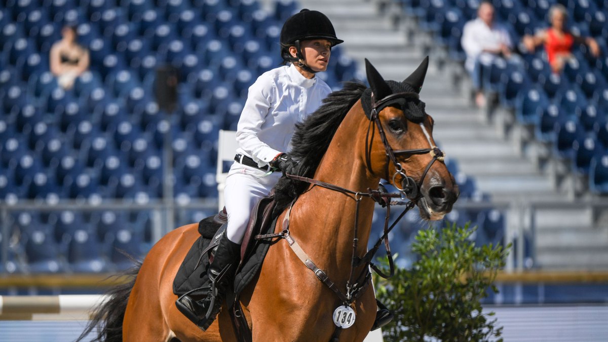 Mary Kate Olsen riding Naomi competes in the Paris Eiffel Jumping
