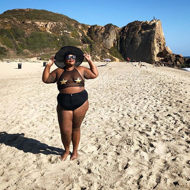 Nicole Byer in Black Starry Bikini