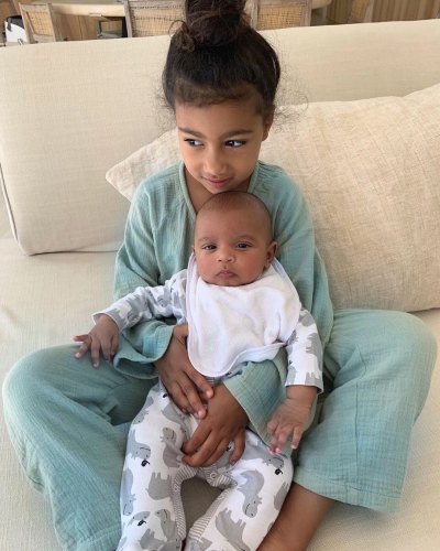 North West Cuddles Baby Brother Psalm While Spurning Saint