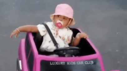 Cardi B's Daughter Kulture in a Pink Jeep