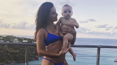 Eva Longoria in a Bikini Holding Her Son