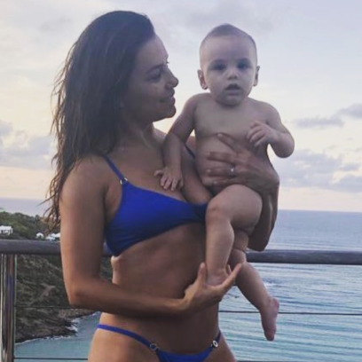 Eva Longoria in a Bikini Holding Her Son