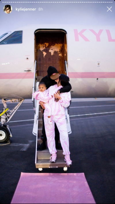 Kylie Jenner Kissing Travis Scott and Holding Stormi Webster