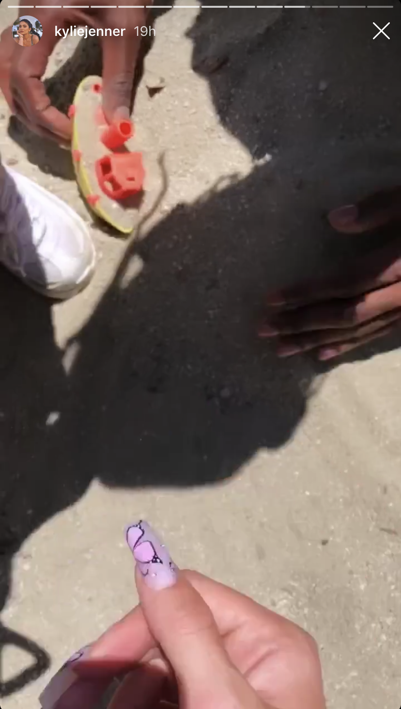 Kylie Jenner, Travis Scott and Stormi at the Park