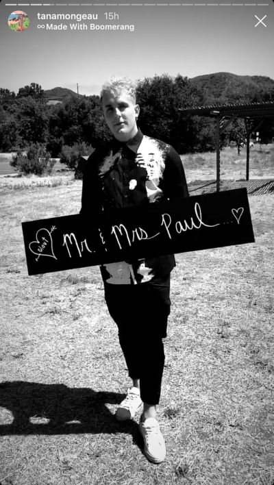 Jake Paul Holding a 'Mr & Mrs Paul' Sign