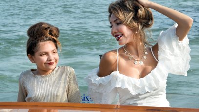 Farrah Abraham and her daughter, Sophia, posing for a photoshoot in Venice wearing dresses and makeup