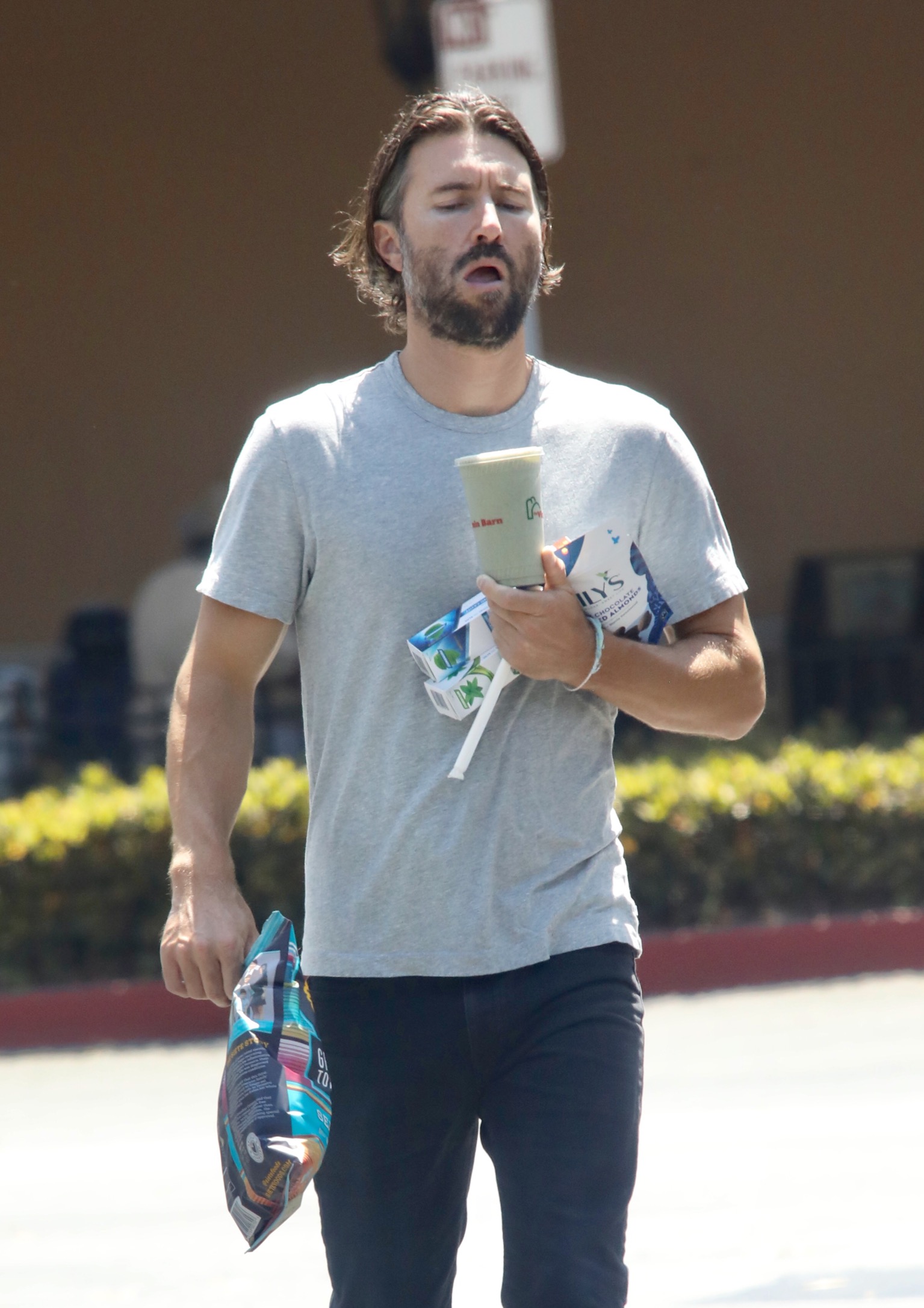 Brandon Jenner out running errands blue shirt and jeans with pregnant Cayley Stoker