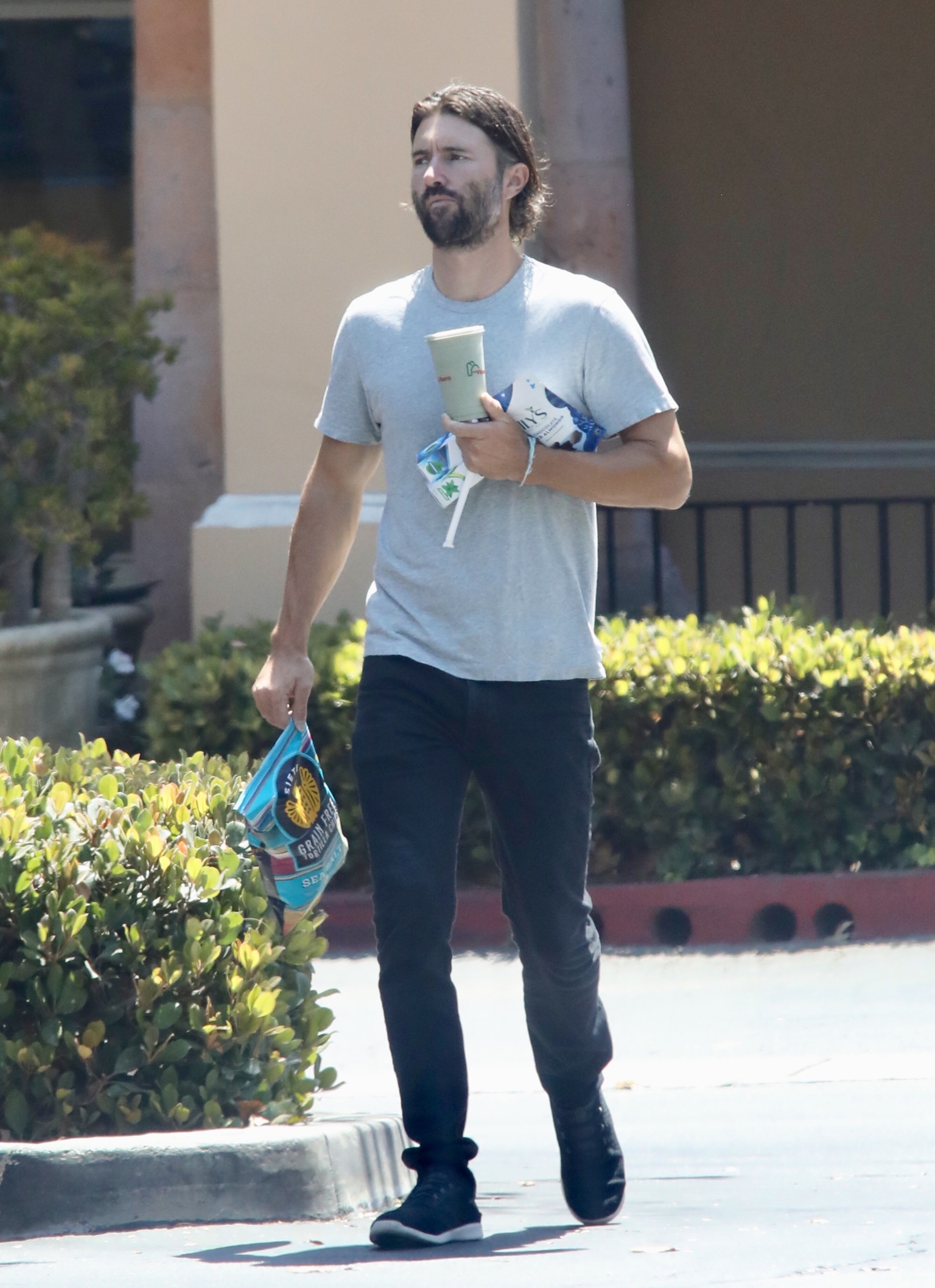 Brandon Jenner out running errands blue shirt and jeans with Cayley Stoker