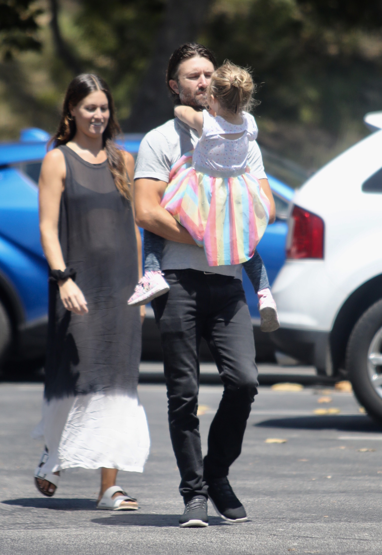 Brandon Jenner out running errands blue shirt and jeans with daughter Eva and pregnant Cayley Stoker