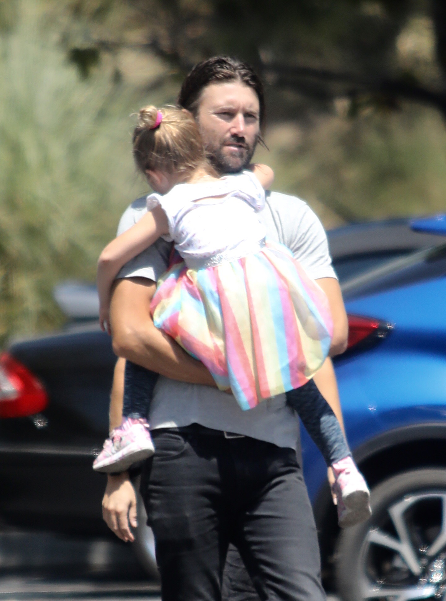 Brandon Jenner out running errands blue shirt and jeans with daughter Eva