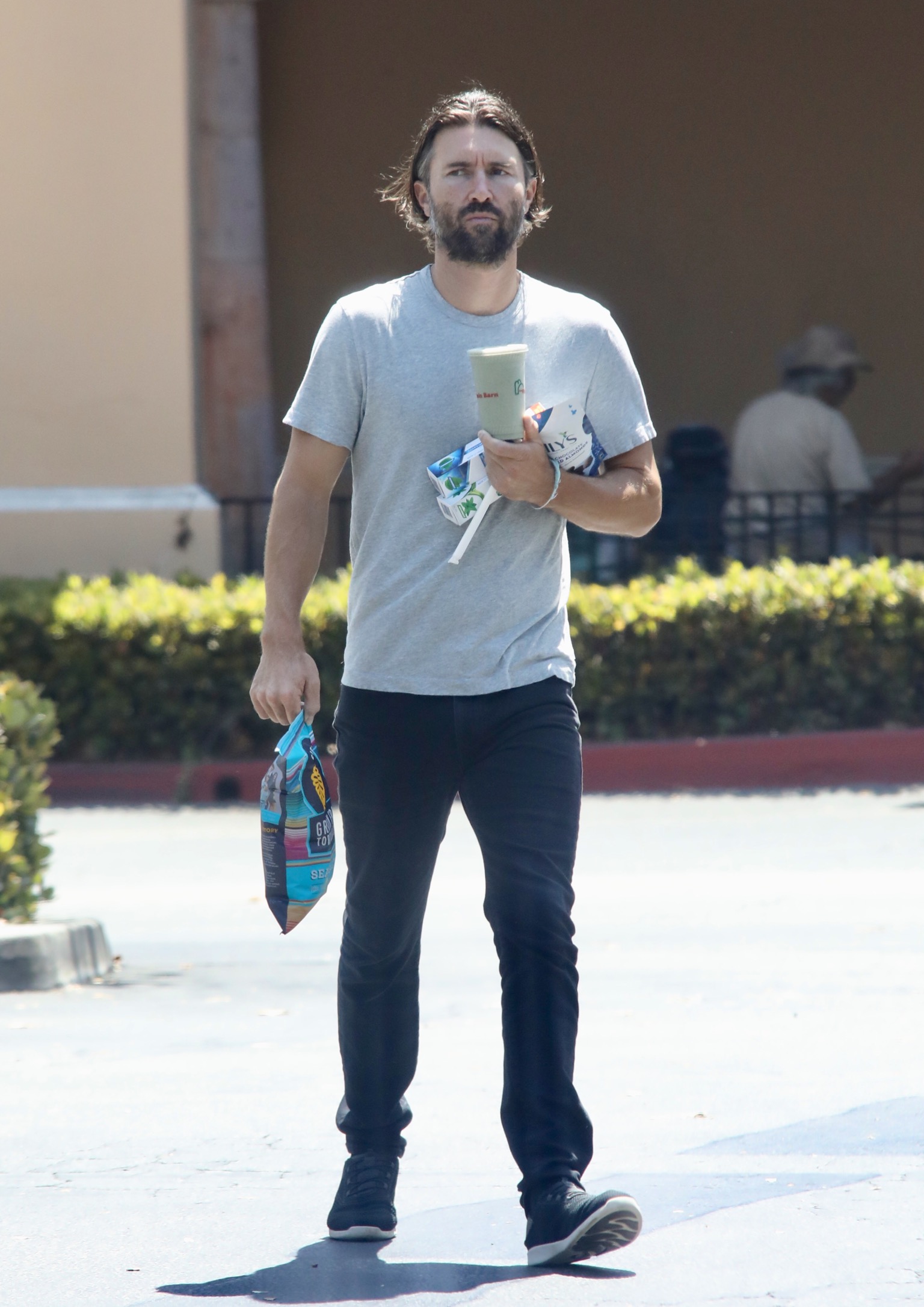 Brandon Jenner out running errands blue shirt and jeans